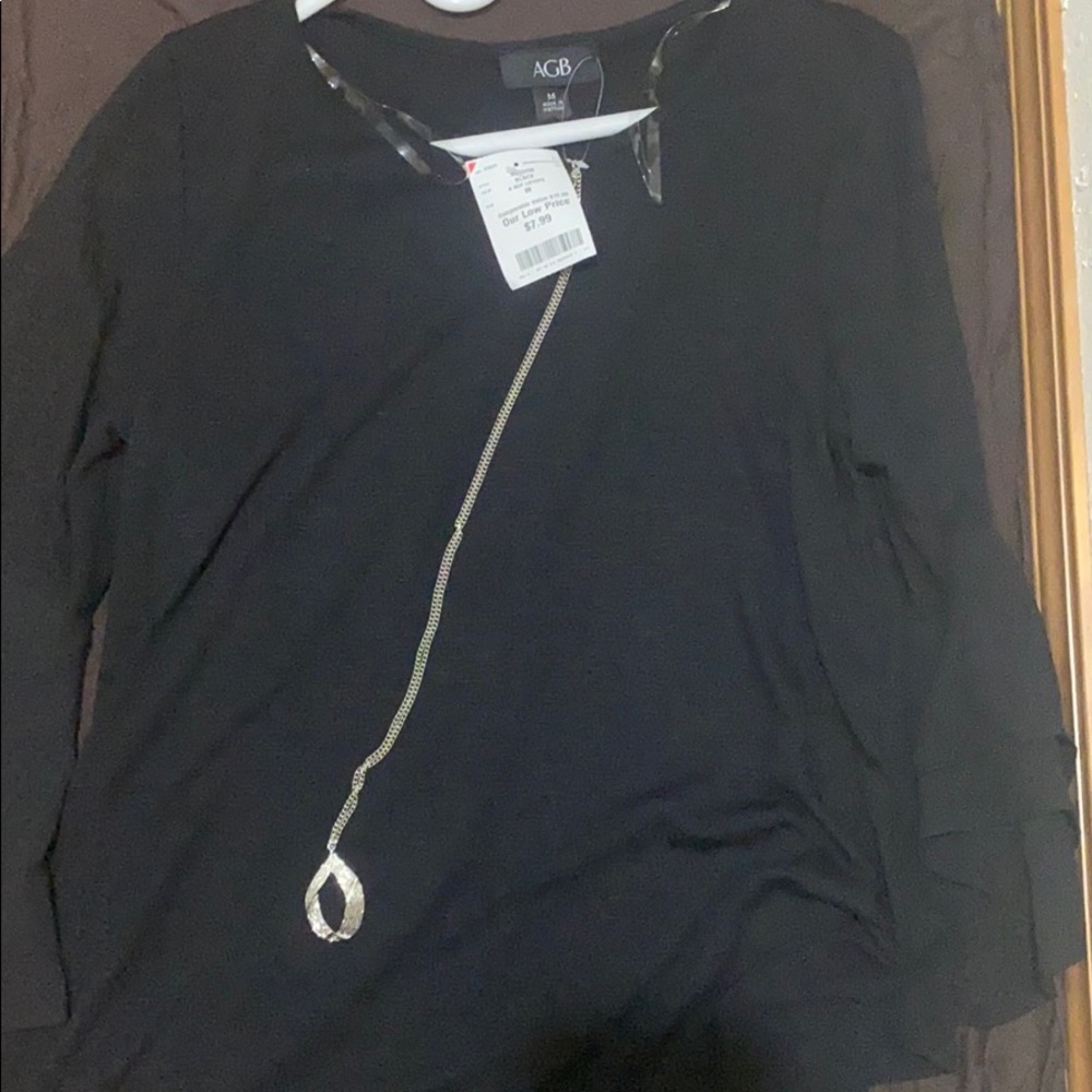 Black ruffle sleeve top